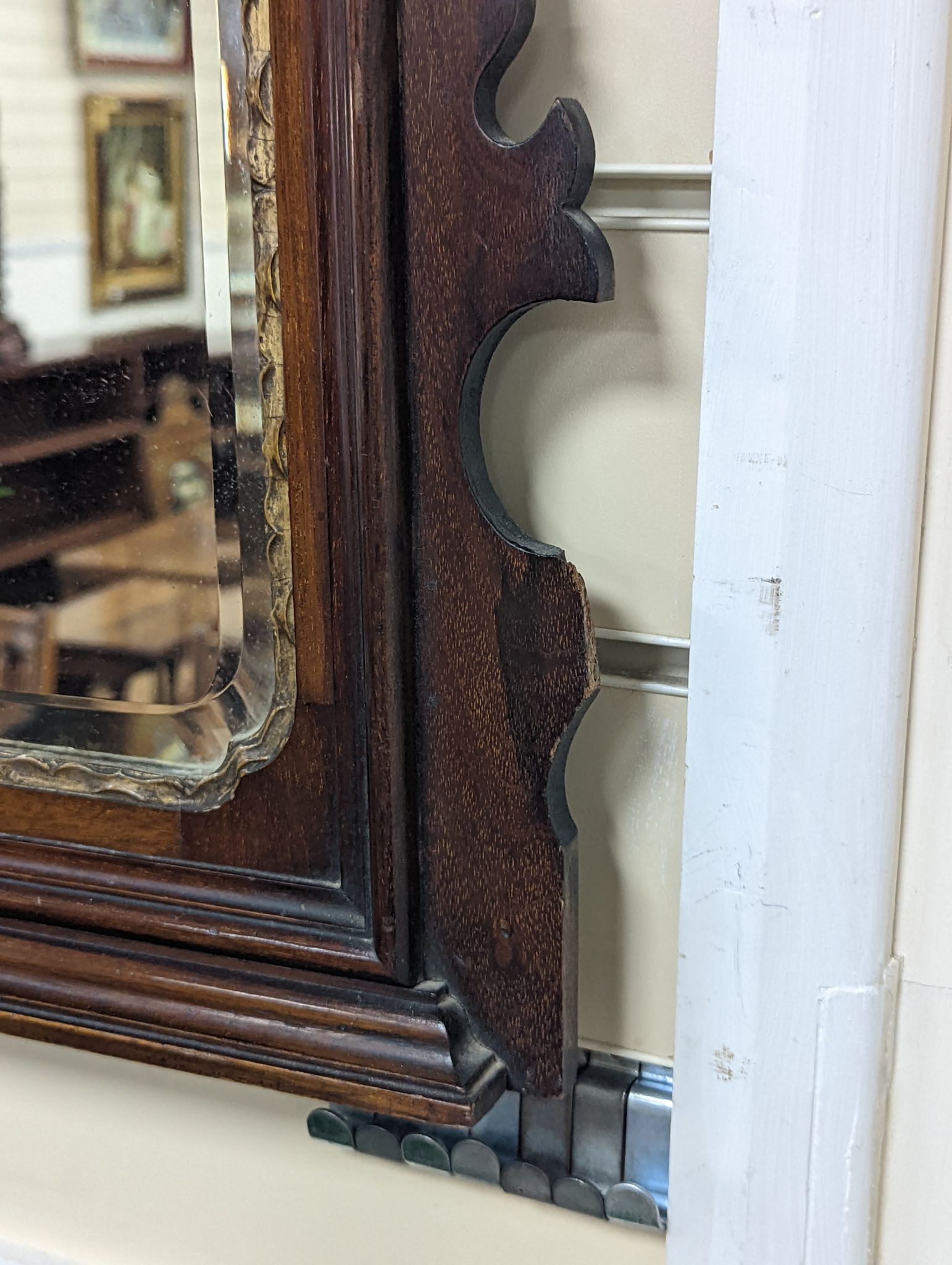 An Edwardian George III style mahogany fret cut triple plate overmantel mirror, width 116cm, height 86cm